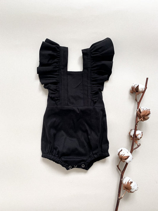 Црн памучен ромпер со карнери