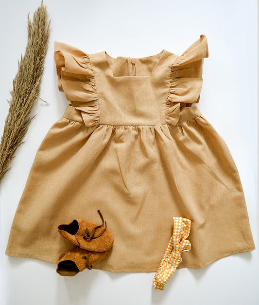 Крем ленено фустанче со карнери